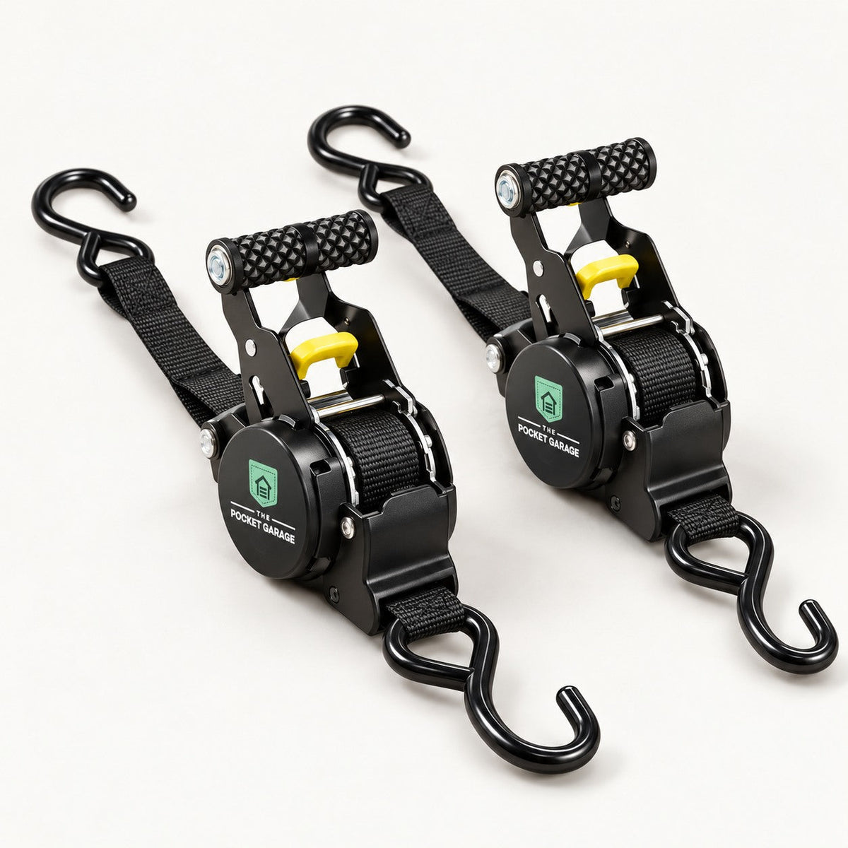 PocketStrap Retractable Ratchet Tie-Downs (9 ft), 2-pack with The Pocket Garage branding on a warm off-white background.